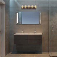 Load image into Gallery viewer, Pista Vanity Wall Light in bathroom.