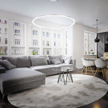 Load image into Gallery viewer, Spunto LED Chandelier in living room.