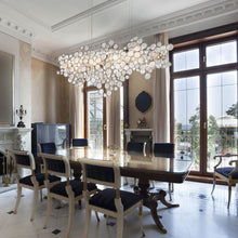 Load image into Gallery viewer, Trento Linear Chandelier in dining room.