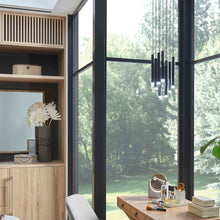 Load image into Gallery viewer, Harmony LED Pendant Light in living room.