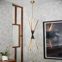 Load image into Gallery viewer, Rae LED Pendant Light in living room.