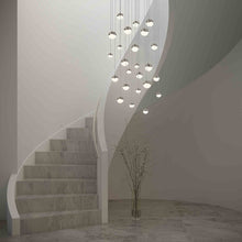Load image into Gallery viewer, Grapes® 24-Light Round LED Multipoint Pendant Light in living room.