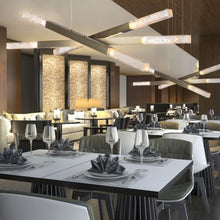 Load image into Gallery viewer, Axis Moda Triple LED Linear Pendant Light in restaurant.