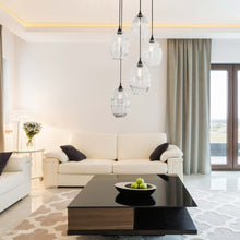 Load image into Gallery viewer, Ellisse Round Multi Light Pendant Light in living room.