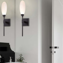 Load image into Gallery viewer, Fiori LED Wall Light in bathroom.