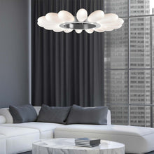 Load image into Gallery viewer, Fiori Radial Ring LED Chandelier in living room.