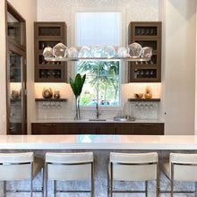 Load image into Gallery viewer, Gem Bezel LED Linear Pendant Light in dining room.