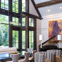 Load image into Gallery viewer, Gem Bezel LED Linear Pendant Light in living room.