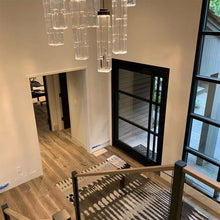 Load image into Gallery viewer, Ledgestone Round LED Multi Light Pendant Light in living room.