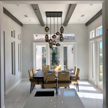 Load image into Gallery viewer, Misto Multi Light Pendant Light in living room.