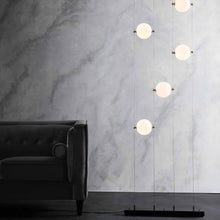 Load image into Gallery viewer, Abacus Floor to Ceiling Plug-In LED Light in living room.