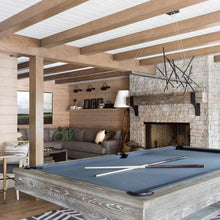 Load image into Gallery viewer, Cascade LED Pendant Light in living room.