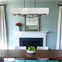 Load image into Gallery viewer, Cavaletti Pendant Light in dining room.