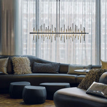 Load image into Gallery viewer, Cityscape Large LED Pendant Light in living room.