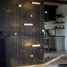 Load image into Gallery viewer, Libra Double Linear LED Pendant Light in living room.