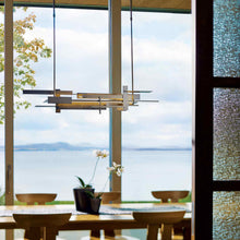 Load image into Gallery viewer, Planar LED Pendant Light in dining room.