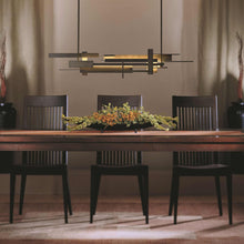 Load image into Gallery viewer, Planar LED Pendant Light in dining room.
