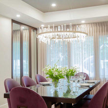 Load image into Gallery viewer, Solitude Circular LED Pendant Light in dining room.