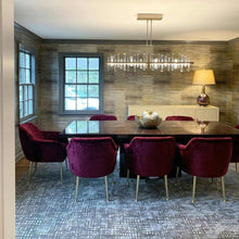 Load image into Gallery viewer, Solitude Linear LED Pendant Light in living room.