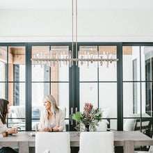 Load image into Gallery viewer, Solitude Linear LED Pendant Light in living room.