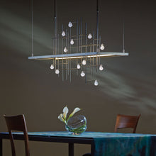 Load image into Gallery viewer, Spring LED Linear Pendant Light in dining room.