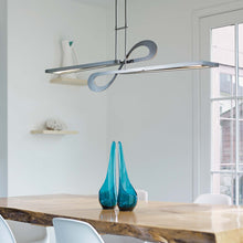 Load image into Gallery viewer, Switchback LED Pendant Light in dinning room.