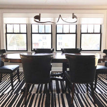 Load image into Gallery viewer, Zephyr LED Pendant Light in Dining Room.