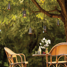 Load image into Gallery viewer, Calder LED Outdoor Pendant Light in Outside Area.
