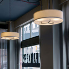 Load image into Gallery viewer, Hampton Drum Pendant Light in restaurant.