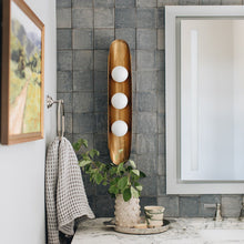 Load image into Gallery viewer, Hopper Wall Light in bathroom.
