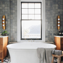 Load image into Gallery viewer, Hopper Wall Light in bathroom.