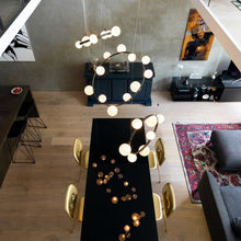 Load image into Gallery viewer, Hubble Bubble Chandelier in dining room.