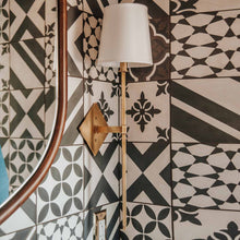Load image into Gallery viewer, Cortland Wall Light in bathroom.