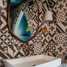 Load image into Gallery viewer, Cortland Wall Light in bathroom.