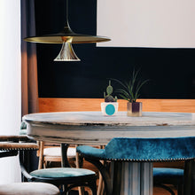 Load image into Gallery viewer, Ipno LED Pendant Light in living room.