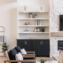 Load image into Gallery viewer, Ivy LED Wall Light in living room.