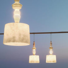 Load image into Gallery viewer, Alibabig LED Pendant Light in Outside Area.