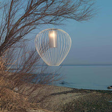 Load image into Gallery viewer, Cell Outdoor LED Pendant Light in Outside Area.