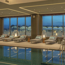 Load image into Gallery viewer, Cell Outdoor LED Table Lamp in the pool.