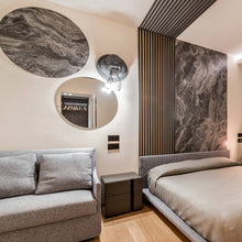 Load image into Gallery viewer, Ugo Rilla LED Wall Light in bedroom.