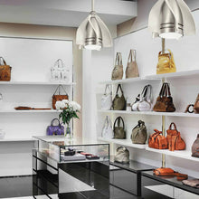 Load image into Gallery viewer, Terna LED Ceiling Fan in showroom.