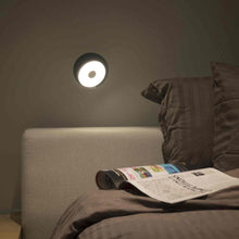 Load image into Gallery viewer, Gravy Hardwire LED Wall Light in bedroom.