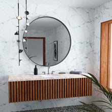 Load image into Gallery viewer, Geode LED Pendant Light in bathroom.