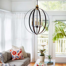 Load image into Gallery viewer, Cirque Chandelier in living room.
