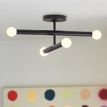 Load image into Gallery viewer, Millie Convertible Pendant Light in living room.