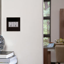 Load image into Gallery viewer, adorne® Cast Metals Wall Plate in living room.