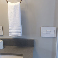 Load image into Gallery viewer, adorne® Paddle Switch in bathroom.
