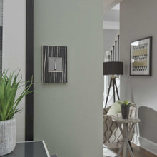 Load image into Gallery viewer, adorne® Real Materials Plus 1-Gang Wall Plate in living room.
