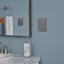 Load image into Gallery viewer, adorne® Tamper-Resistant GFCI in bathroom.