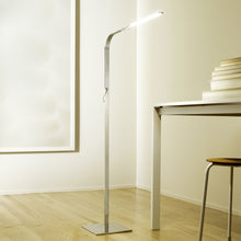 Load image into Gallery viewer, LIM L LED Floor Lamp in living room.